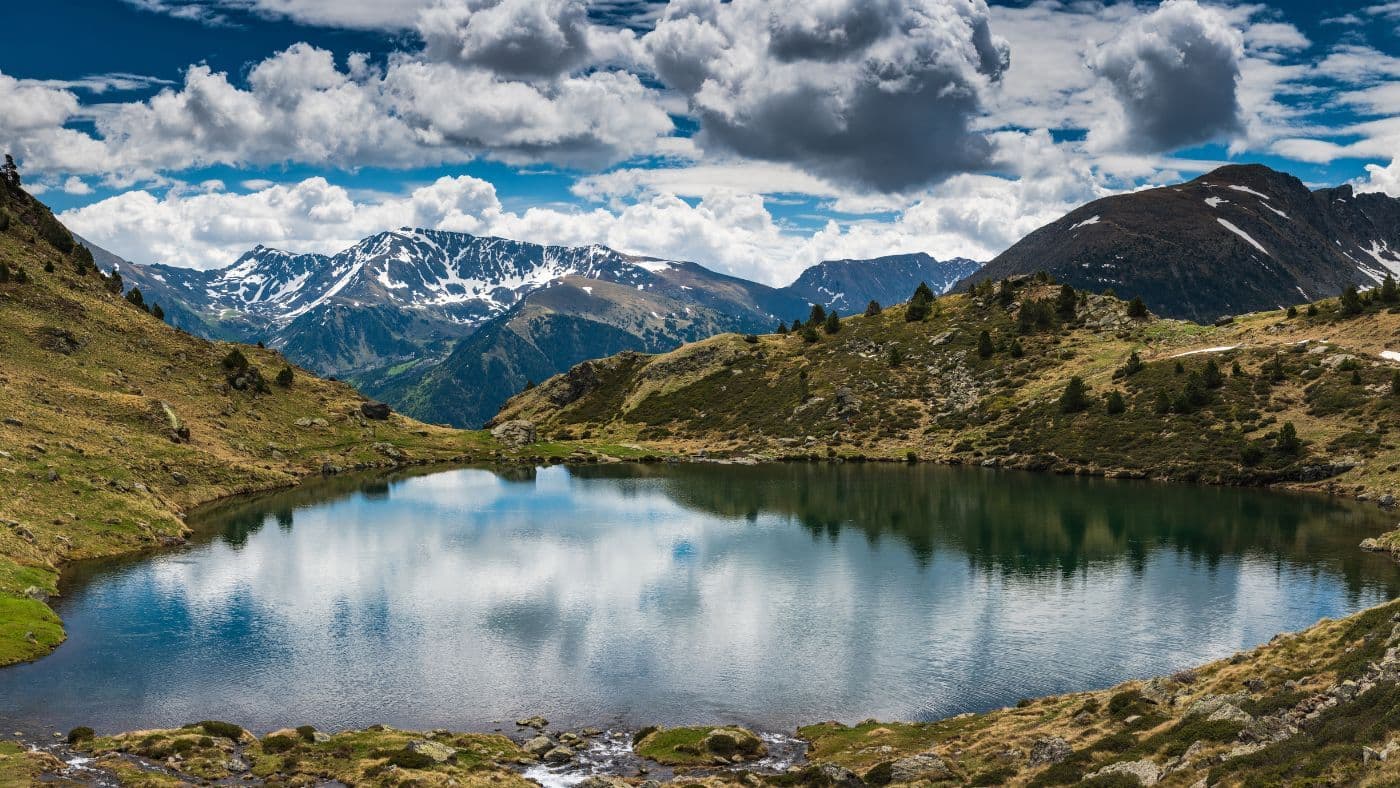Wide panoramic vista over Tristaina lake,Andorra