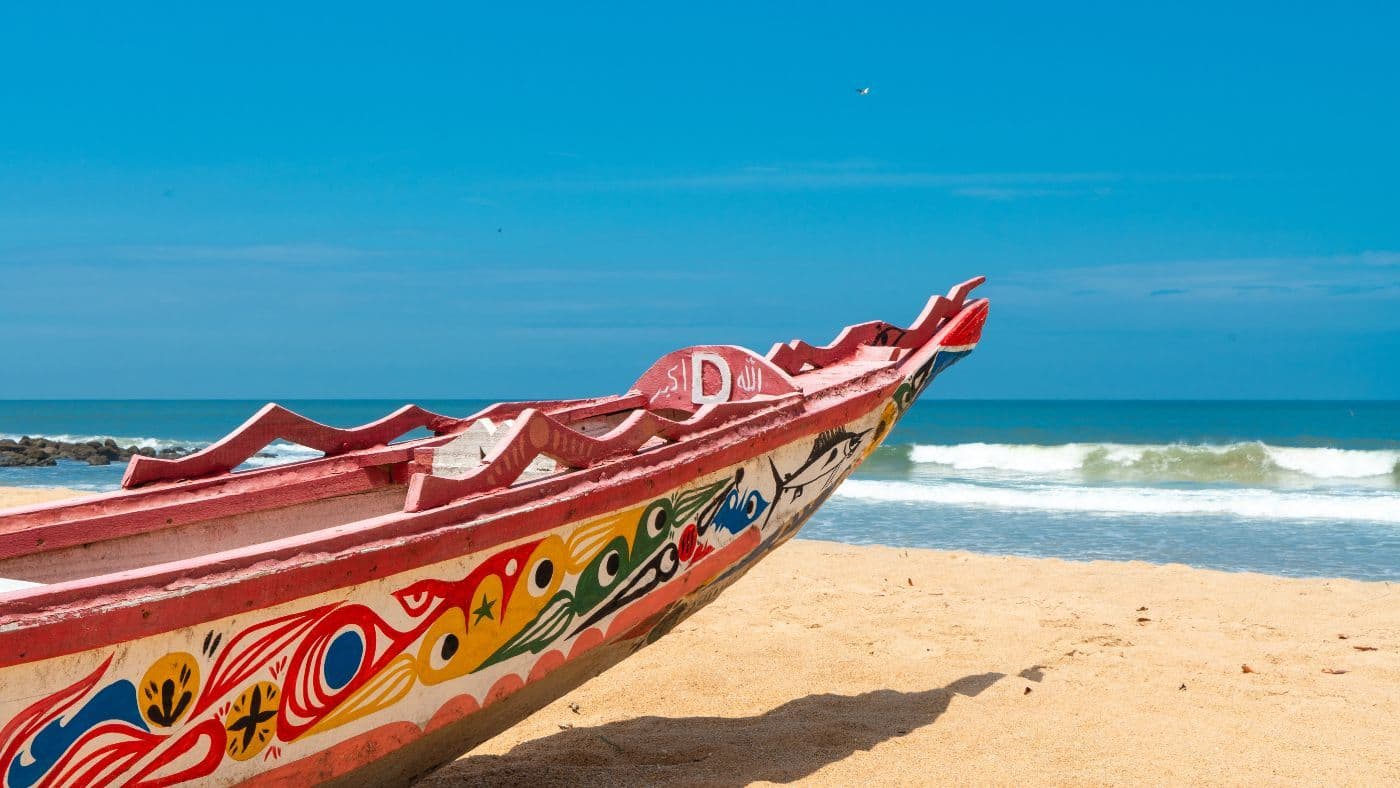 Colourful fisher boat on the beach, Somone, Senegal